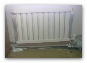 Installed electric vacuum radiator