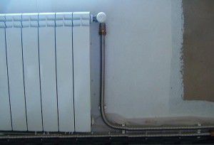 Connecting the radiator to the heating system using a corrugated pipe