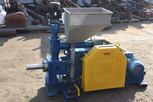 Fuel briquette extruder